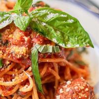 Spaghetti Al Pomodoro · With cherry tomato, basil, and parmigiano cheese.