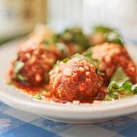 Meatballs · Beef meatballs with grilled bread, pomodoro sauce, pecorino