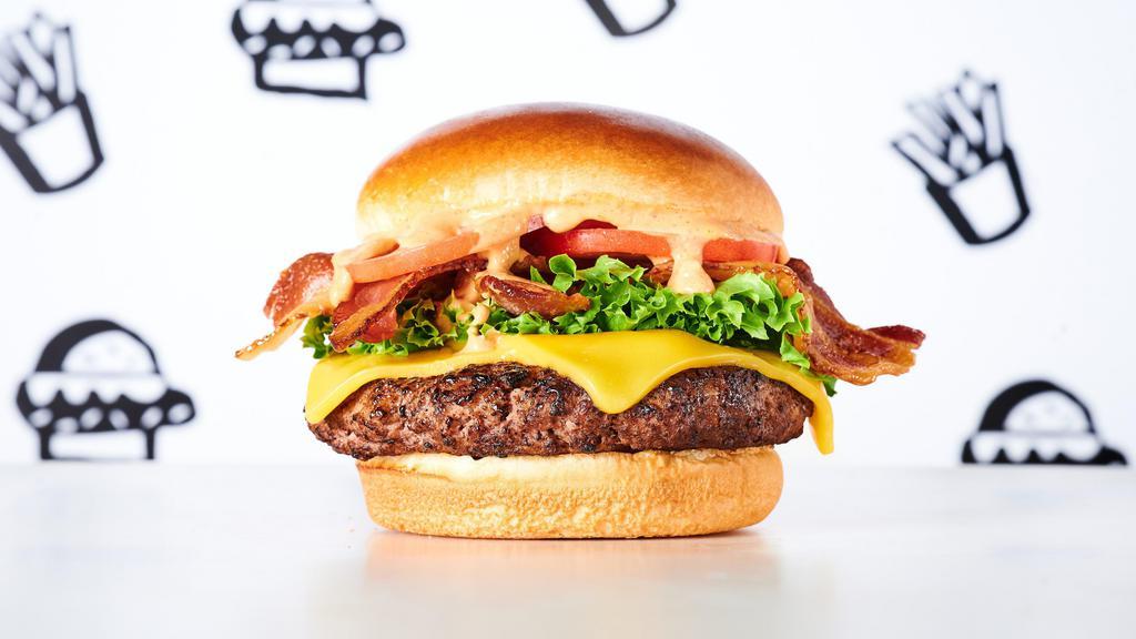 Vagabond Cheeseburger · Burger, lettuce, tomato, American cheese, bacon & Mob Sauce