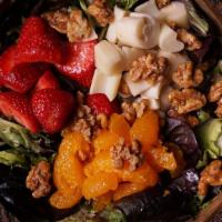 Mocha Bleu Salad · Hearts of palm, mandarin orange, sugared nuts, strawberries, red onion, and raspberry vinaig...