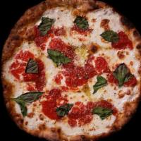 Margherita Pizza · San-Marzano tomato sauce, fresh mozzarella, and basil.