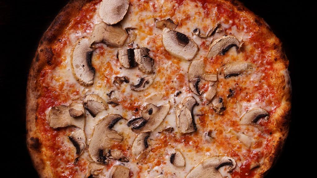 Al Funghi Pizza · Wild mushrooms, mozzarella, and marinara.