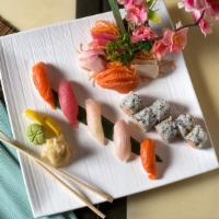Sushi Sashimi Platter A · 9 pieces of sashimi and 5 pieces of sushi with spicy crab roll. Served with miso soup and gr...