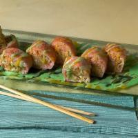 Paradise Roll · Soybean sheet wrapped with lobster salad, shrimp, tempura, tempura banana with mango yuzu an...
