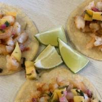 Tacos De Camaron (Shrimp Tacos) · Order of three. Served with habanero mango sauce.