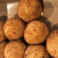 Prosciutto Balls · Four prosciutto balls, Aiello’s family secret recipe.