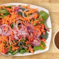 Side Salad · Mixed greens, tomatoes, carrots and red onions. Comes with sticky’s vinaigrette.