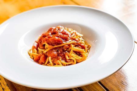 Spaghetti Pomodoro · fresh pasta tossed in a fresh tomato & basil sauce, and parmigiano.