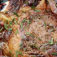 Rib Eye Steak · 15 oz. grass-fed beef, grilled on the bone with roasted pee wee potatoes, cipollini onion, a...