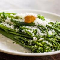 Sautéed Broccolini · with calabrian chili, garlic, and ricotta salata. (gluten-free)