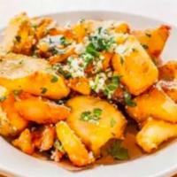 Aita Home Fries · flash-fried and tossed with parmigiano and crispy herbs. (gluten-free)