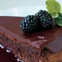 Flourless Dark Chocolate Cake · made with almond flour, blackberries, and chocolate ganache. (gluten-free)