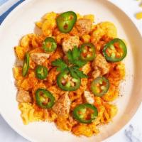 Southern Spicy Chicken Mac · Spicy roasted chicken, chipotle cheese sauce, and jalapenos cooked in a blend of creamy cheese