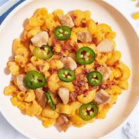 Chicken Bacon Banger Mac · Premium chicken, bacon, cooked in a creamy cheese sauced and topped with jalapenos to give a...
