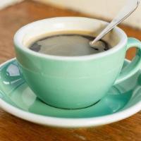 Americano · Double espresso poured over hot water