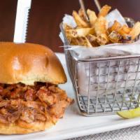 The Daler Sandwich · Pulled pork with bbq sauce and frizzled onions, fries coleslaw and pickle