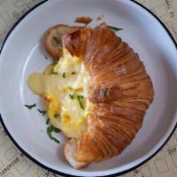 Egg & Cheese Croissant · scrambled eggs, cheddar and parsley,. on a fresh baked croissant