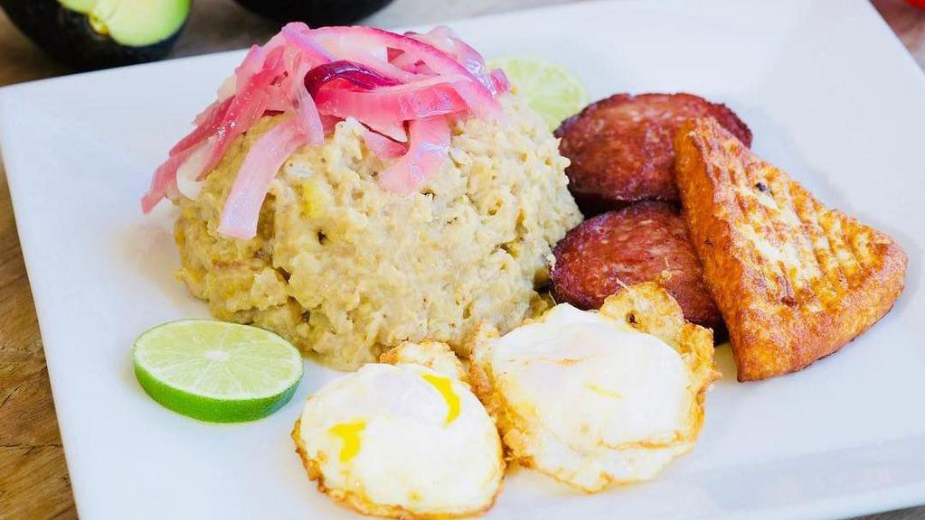 Mangú Con Los 3 Golpes · Dominican breakfast special. Mashed green plantains. Dominican sausage, fried cheese, fried eggs. Add longaniza for an additional charge.