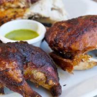 Pollo Entero · Whole chicken, nice and beans, salad and fried plantains or sweet plantains.