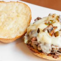 Philly Cheese Steak Sandwich · Sauteed with peppers and onions on a hero.