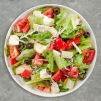 In The House Salad · Romaine lettuce, mixed baby greens, vine tomatoes, Bermuda onions, cucumbers, black olives, ...