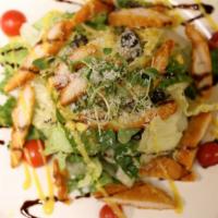 Vegan Southern Cajun Salad · Fresh greens topped with tomatoes, corn, mushrooms, and vegan cheese.