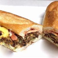 Philly Cheesesteak · it Comes with Onion, Green Pappers, cheese, lettuce, tomato, and mayonaaise