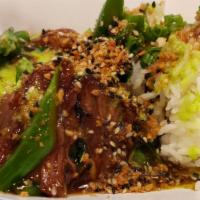 Beef & Chinese Broccoli · Slow cooked beef shortrib, Chinese brocolli, crispy garlic, jasmine rice