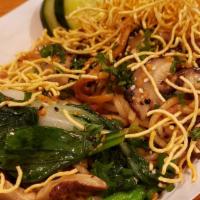 Sichuan Spicy Crispy Noodles · Sauteed Shanghai noodles with marinated chopped pork, Sichuan pepper and crispy noodles.