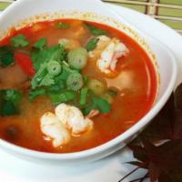 Tom Yum Soup (Spicy) · Hot and sour soup. Spicy and sour soup with lemon grass, lime leaves and fresh squeezed lime...