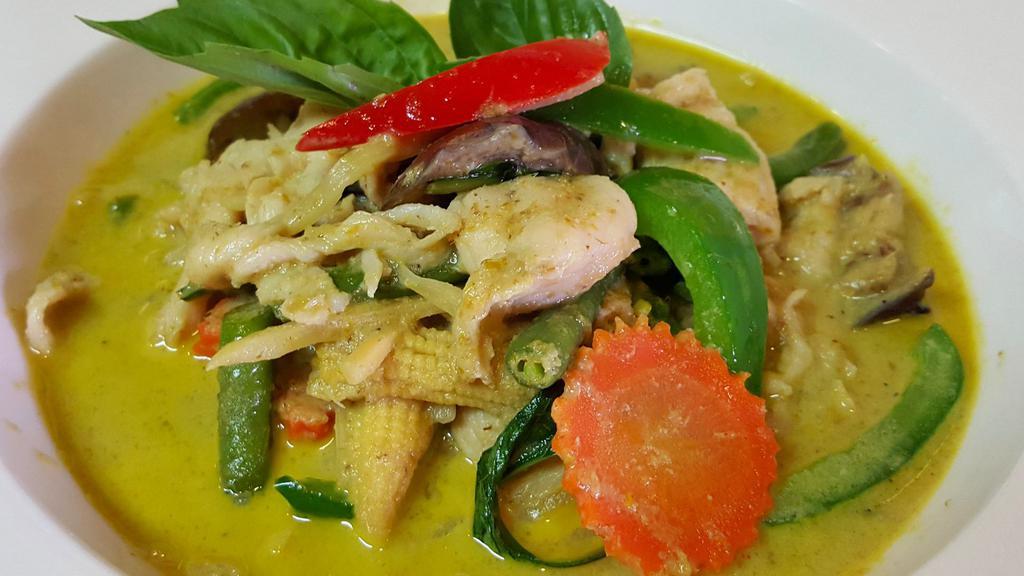Green Curry · Medium spicy. Coconut milk with green curry, snow peas, eggplants, bamboo shoots, carrots, green bell pepper, basil leaves and lime leaves. Add chicken, beef, pork or shrimp for an additional charge.
