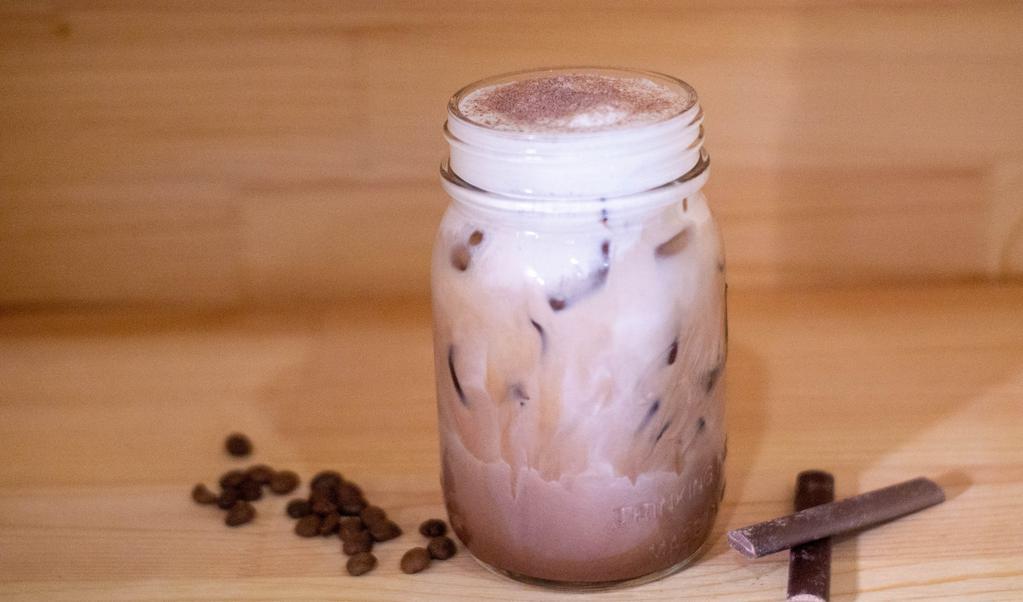 Iced Mocha · Rich medium-light roasted espresso shot with 40% dark cholocate, topped with your choice of milk.