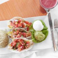 Shrimp Tacos · Grilled shrimp, mango slaw, pico de gallo, guacamole, sour cream, flour tortillas and cilant...