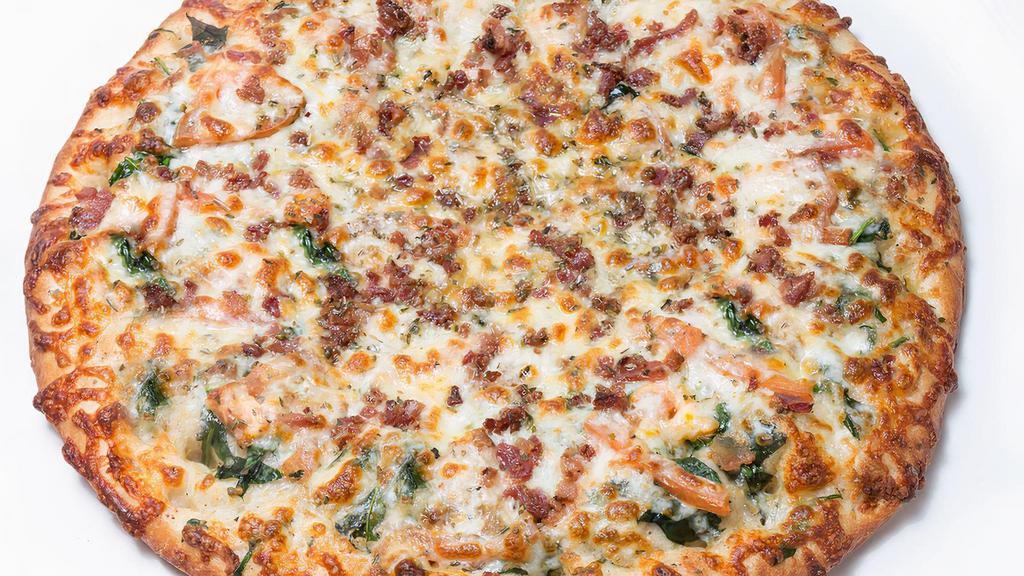 The B.L.T. Pizza · White garlic sauce, bacon, fresh spinach, sliced tomato, mozzarella cheese, pecorino Romano and oregano.