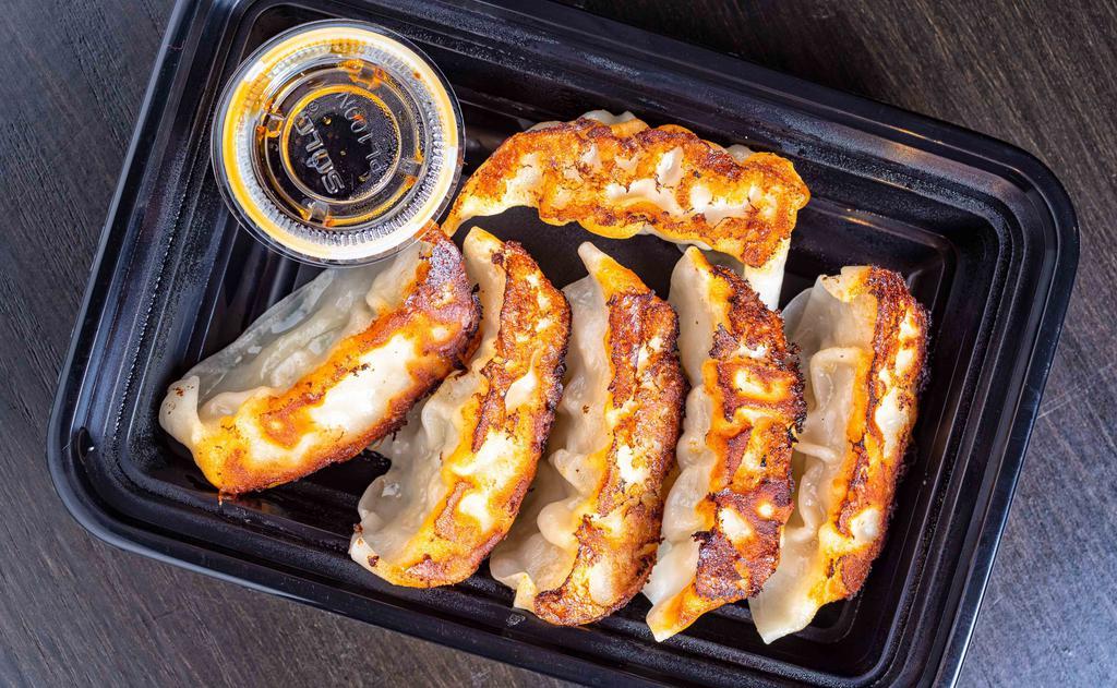 Gyoza ( 6Pcs) · Meat and vegetable filled dumplings steamed or pan fried. * 
 
*Popular
