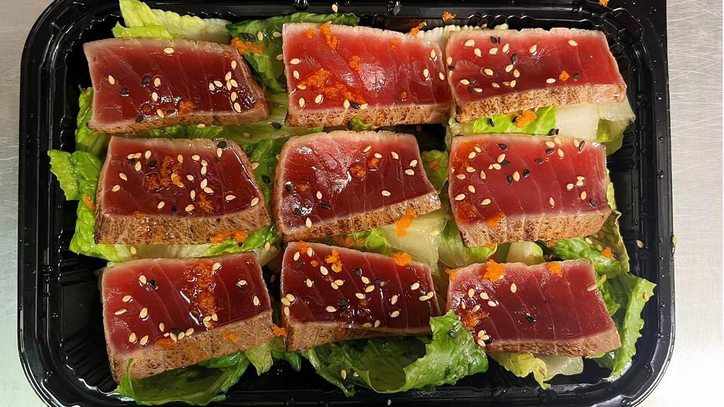 Tuna Tataki · Seared tuna with tobiko in ponzu sauce.