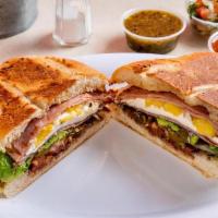 Mexicana Torta · Grilled steak, melted cheese, and Mexican sausage. Traditional Mexican sandwich, served on a...