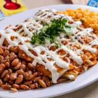 Cheese Enchiladas · Three soft corn tortillas smothered with your choice of sauce and topped with chopped cilant...
