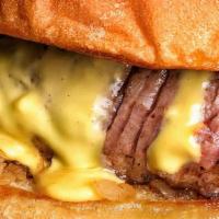 Filet Mignon Sandwich · Center cut Filet Mignon w/ caramelized onions and melted cheese.