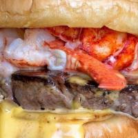 Steak & Lobster Sandwich · Center cut Filet Mignon w/ caramelized onions, melted cheese, and Fresh Maine Lobster