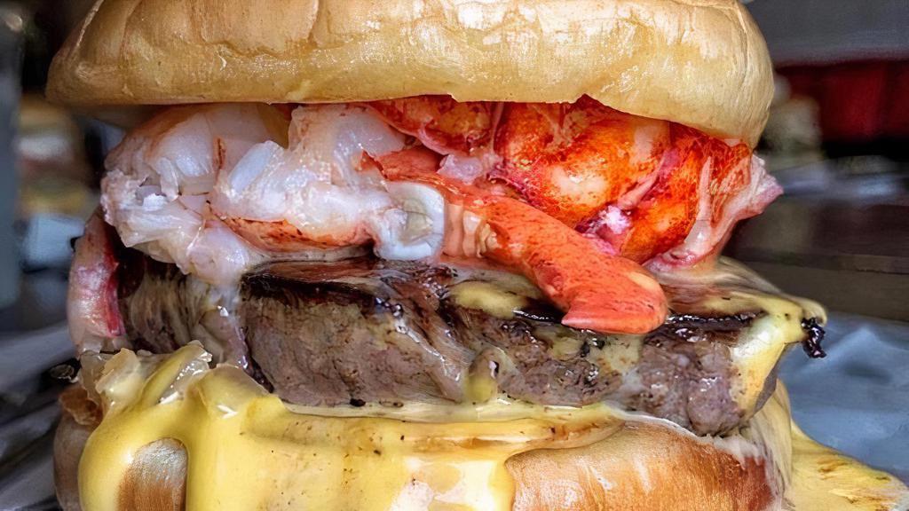 Steak & Lobster Sandwich · Center cut Filet Mignon w/ caramelized onions, melted cheese, and Fresh Maine Lobster