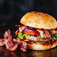 Double Bacon Cheeseburger · Exquisite double beef patty, crispy bacon strips, lettuce, tomatoes, pickles, onions and cus...