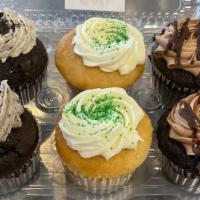 6 Pack Cc -2Van, 2Choc & 2 Cc · Get a 6 variety pack of full sized cupcakes.  It includes  2 vanilla, 2 chocolate and 2 cook...