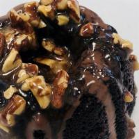 Chocolate Turtle Baby Bam  (Bundt Cake) · 2-3 servings.
4 inch Bundt cake in chocolate topped with caramel and pecans.