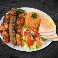 Kefta Kabob Dinner · Grilled ground lamb mixed with chopped onions, parsley and spices served with grilled vegeta...