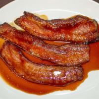 Applewood Smoked Slab Bacon · Maple soy glaze.
