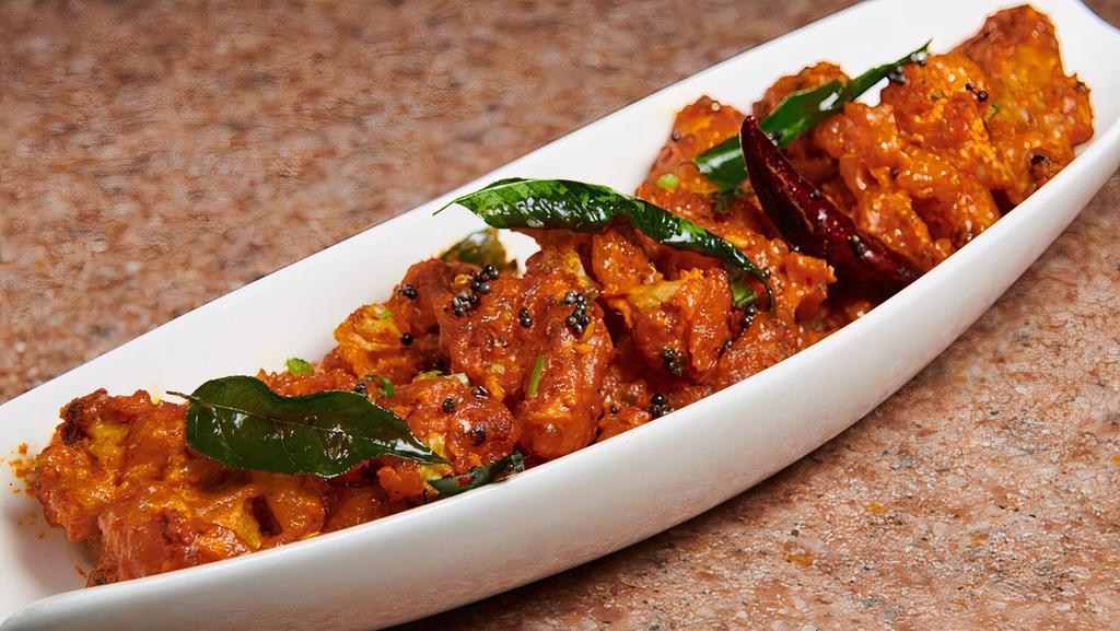 Gobi 65 · Cubes of Gobi marinated in corn with our batter with spices, deep fried and tossed in spices.