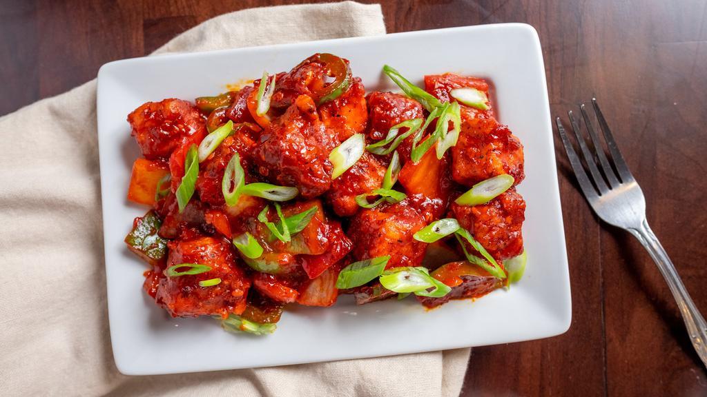Chilli Paneer · Paneer cubes sauteed with onions, peppers, hot chilli and soy sauce.