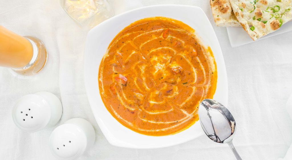 Paneer Butter Masala · Cottage cheese cubes cooked in creamy and rich buttery sauce.