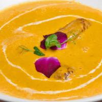Malai Kofta · Cheese and vegetable balls in onion nut cream sauce and spices.